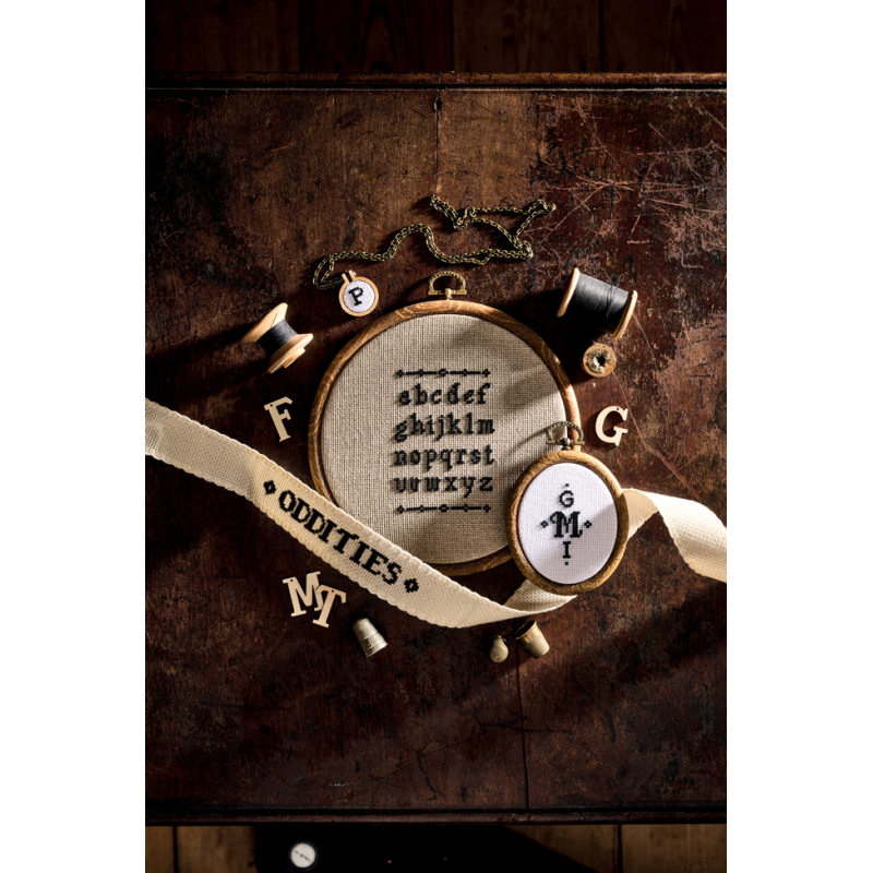 Cabinet de curiosités au point de croix Livre Broderie
